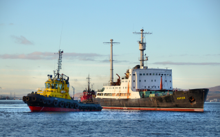 The Lepse being towed out of Murmansk’s Atomflot port, where it languished for 20 years, to Nerpa in September 2012. (Photo: Bellona)